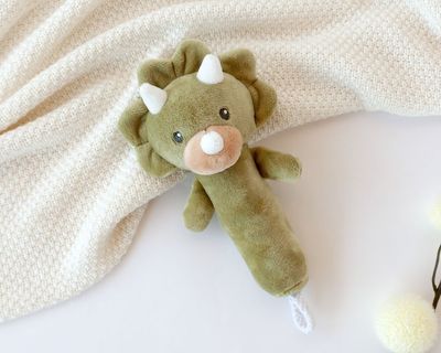 SONAJERO DINOSAURIO VERDE KIOKIDS JUGUETE DE BEBÉ CON MANGO 