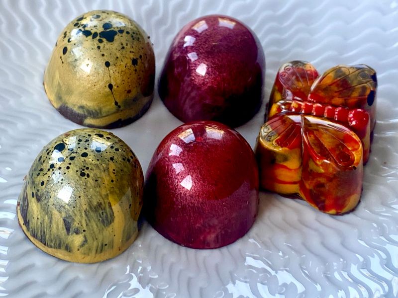 Goldene Momente: Warum der Sommer beste Zeit für Pralinen ist