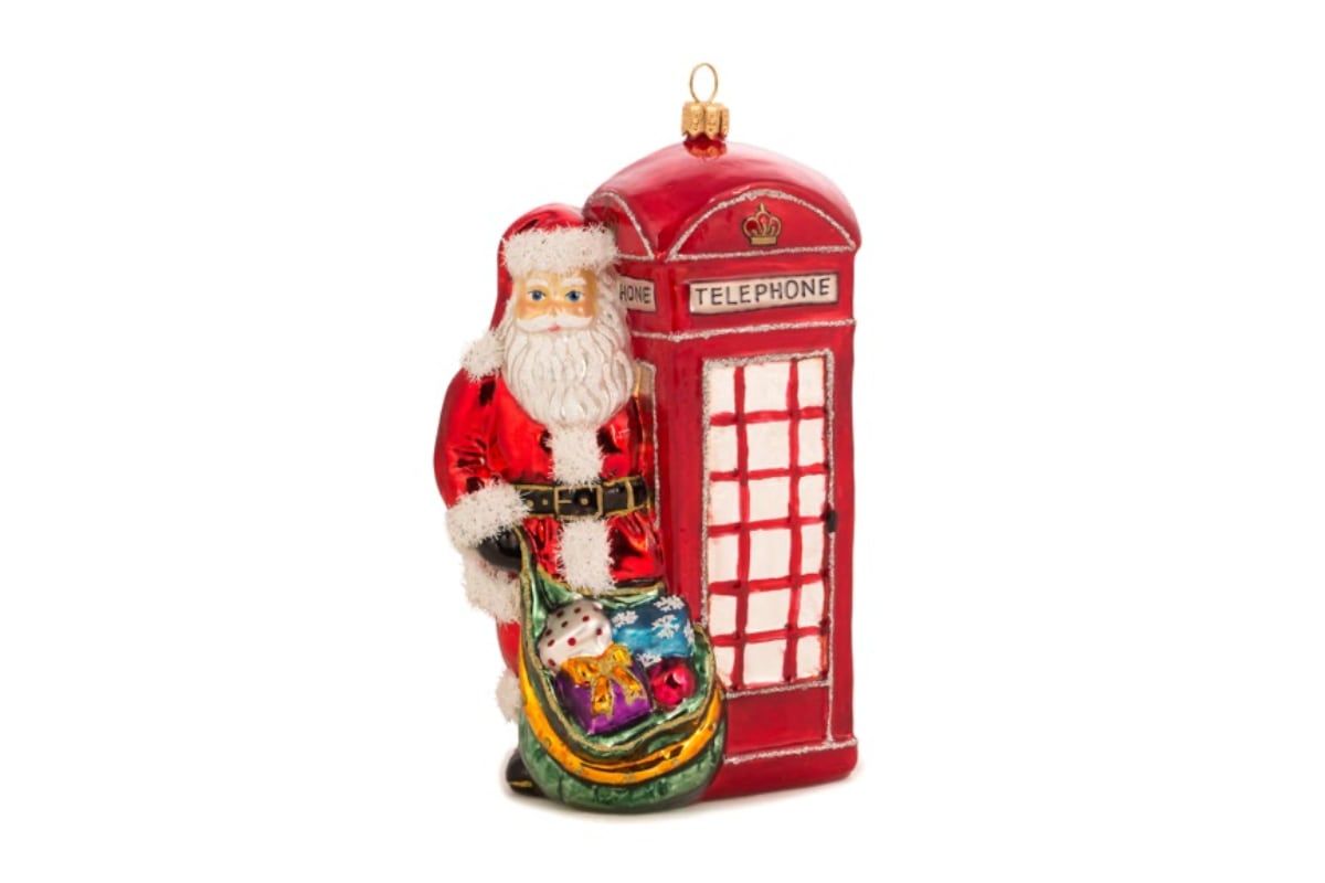 Kerstman met telefooncel