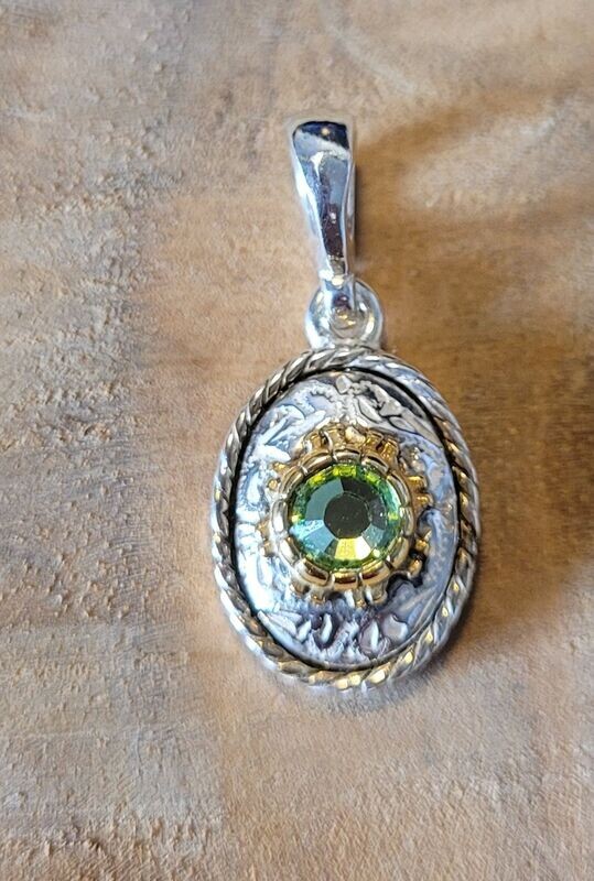 Trachtenanhänge , oval, 925 Silber mit Teilvergoldung , Steinfarbe: apfelgrün peridot