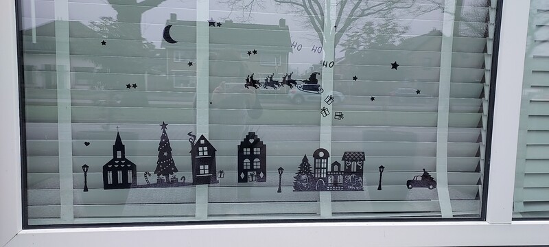 levendige kerststraat statische raamfolie