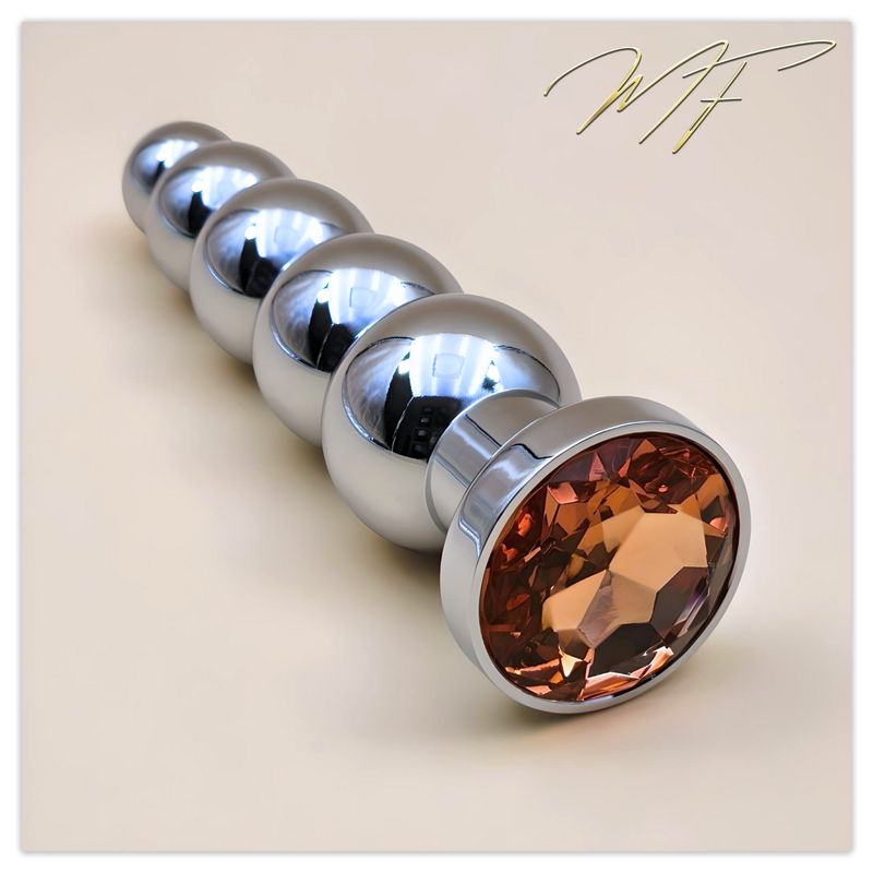 Vaginal-/Anal-Dildo silber/orange Vaginal-/Anal-Dildo silber/orange