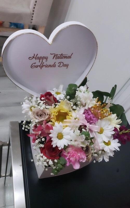 Heart shaped mixed flower box