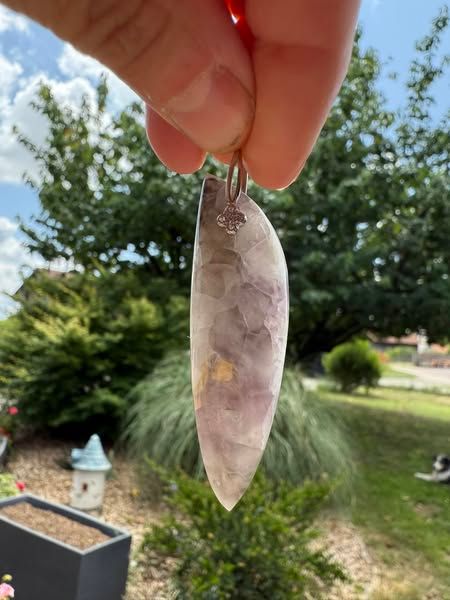 ​Pendentif en fluorite mauve
