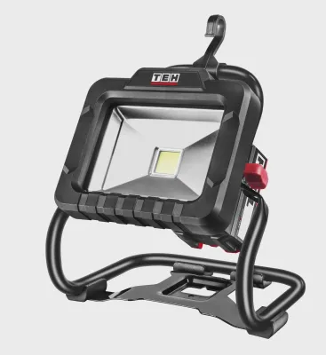 TEH 20V cordless LED work light, black, 1800 lumen, standing on a base with a red switch and handle on top.