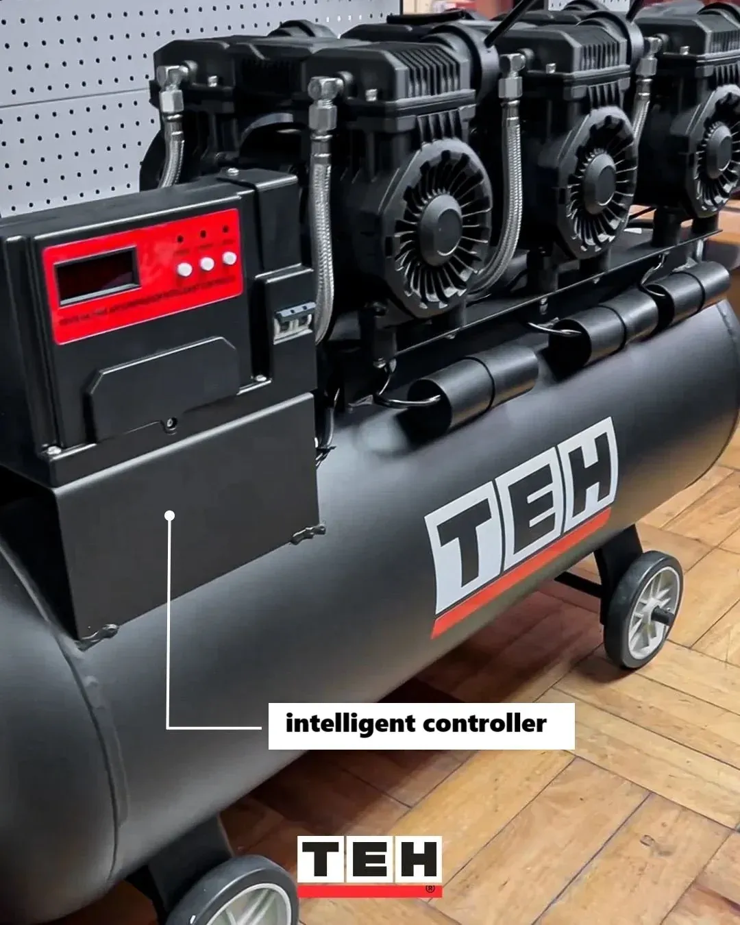 TEH TAC100L oil-free air compressor, black, triple motor, intelligent controller, industrial use, TEH logo.