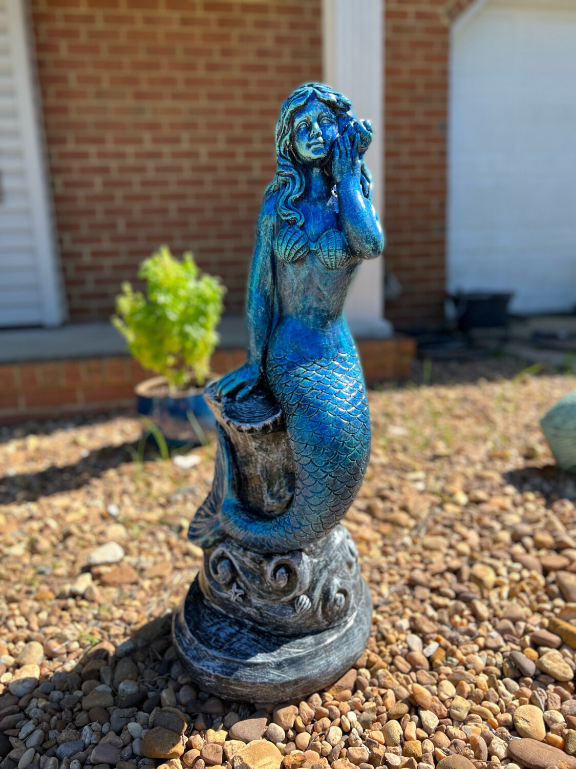 Mermaid On Pedestal