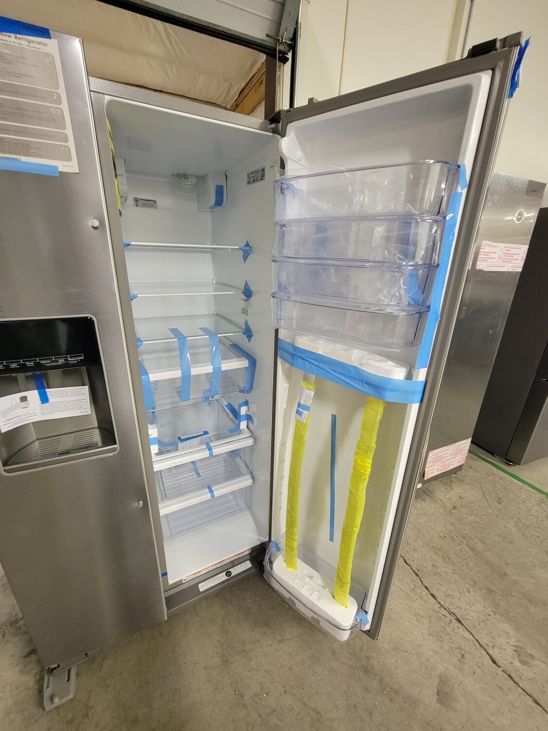 515 Whirlpool 28 cu. ft. Side by Side Refrigerator in Fingerprint