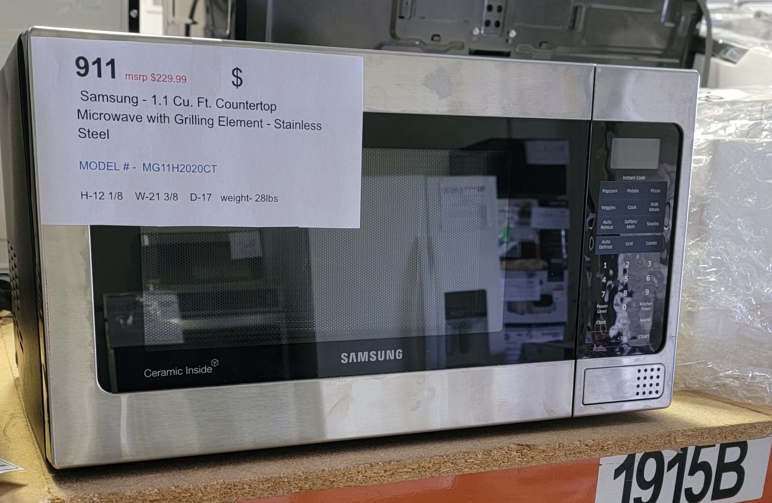 911 Samsung - 1.1 Cu. Ft. Countertop Microwave with Grilling Element - Stainless Steel MG11H2020CT