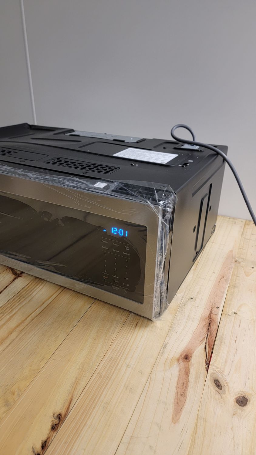 596 Samsung - 1.1 cu. ft. Smart SLIM Over-the-Range Microwave with 400 CFM Hood Ventilation, Wi-Fi &amp; Voice Control - Stainless Steel ME11A7510DS