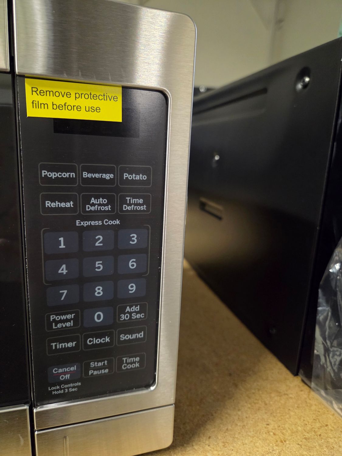 945 GE - 0.7 Cu. Ft. Compact Microwave - Stainless Steel JES1072SHSS