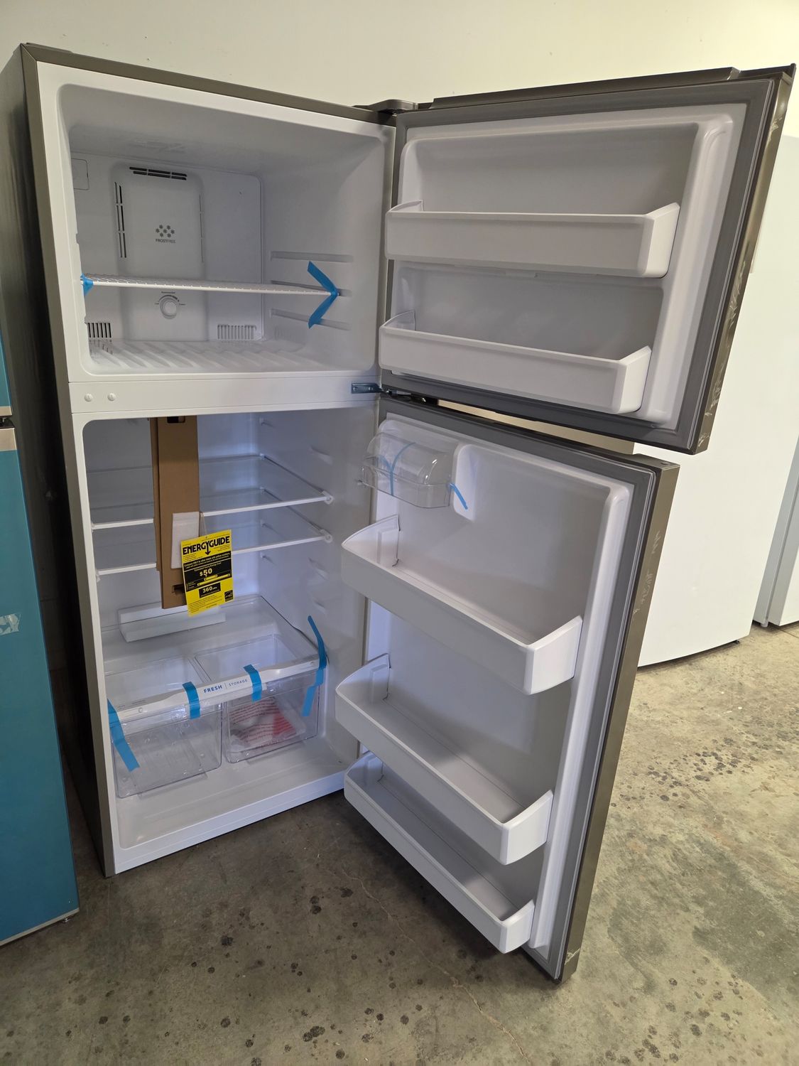 1292 FFHT1822UV Frigidaire® 28 in. 17.6 Cu. Ft. Brushed Steel Top Freezer Refrigerator