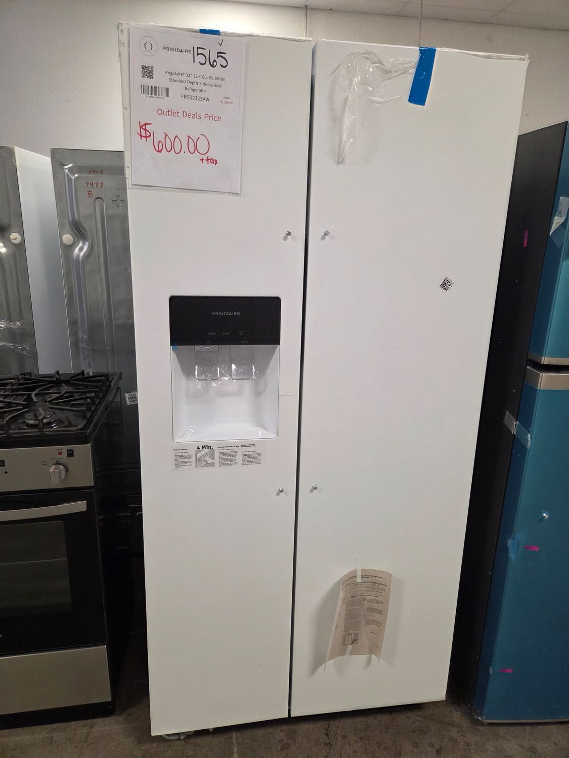 1565 4A51714882- FRSS2323AW Frigidaire® 33" 22.3 Cu. Ft. White Standard Depth Side-by-Side Refrigerator