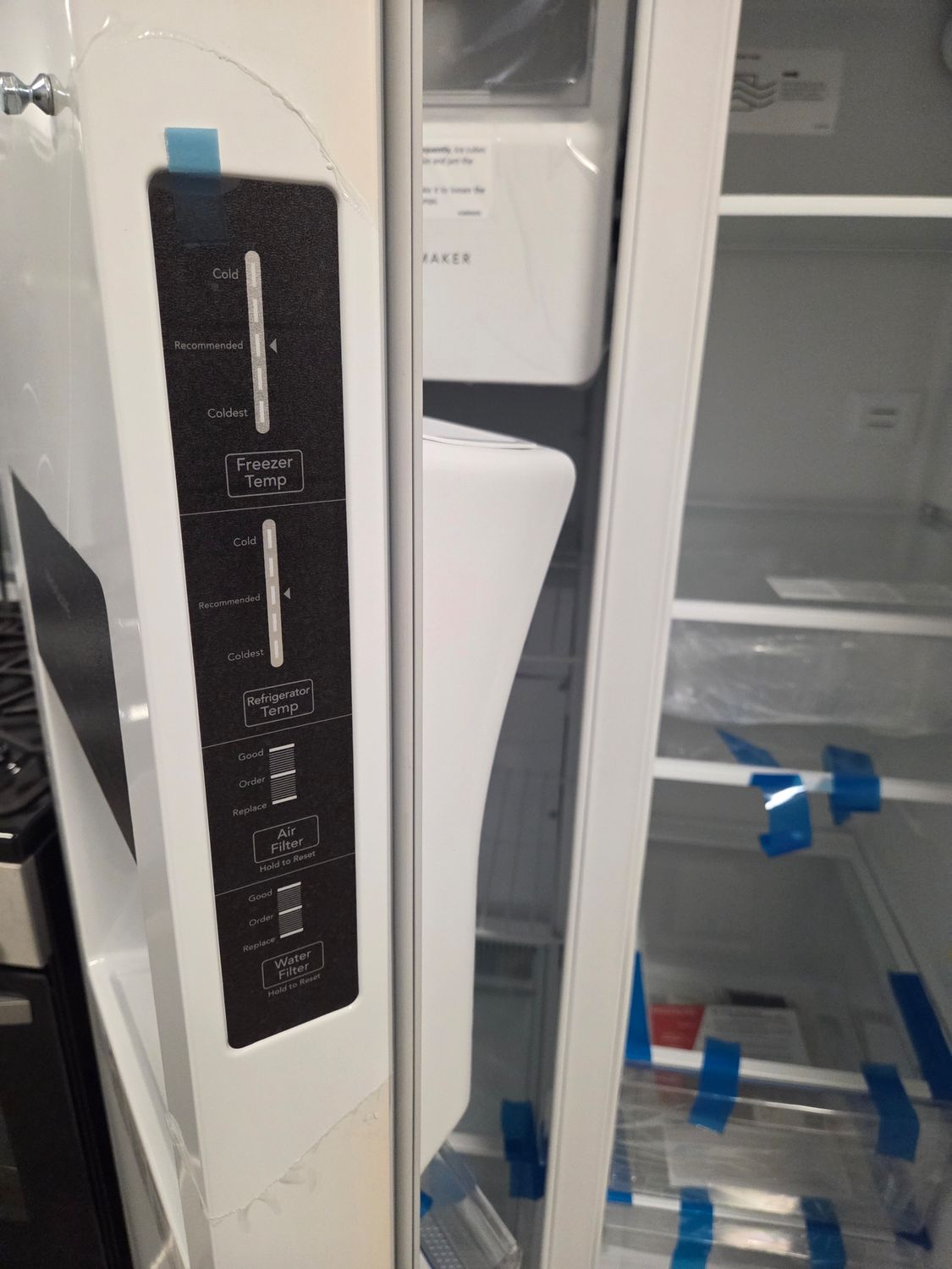 1565 4A51714882- FRSS2323AW Frigidaire® 33" 22.3 Cu. Ft. White Standard Depth Side-by-Side Refrigerator
