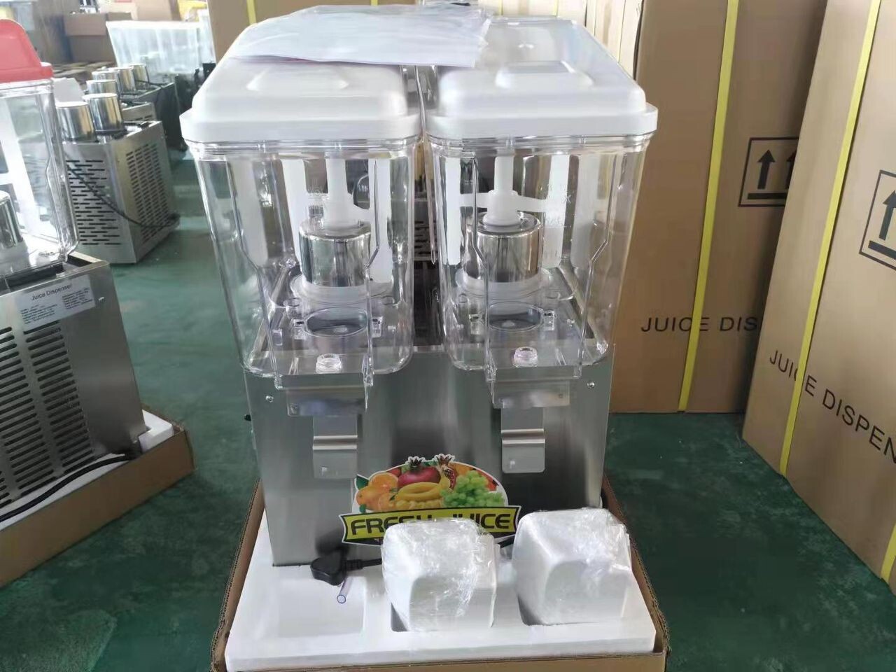 Machine à jus à deux récipients