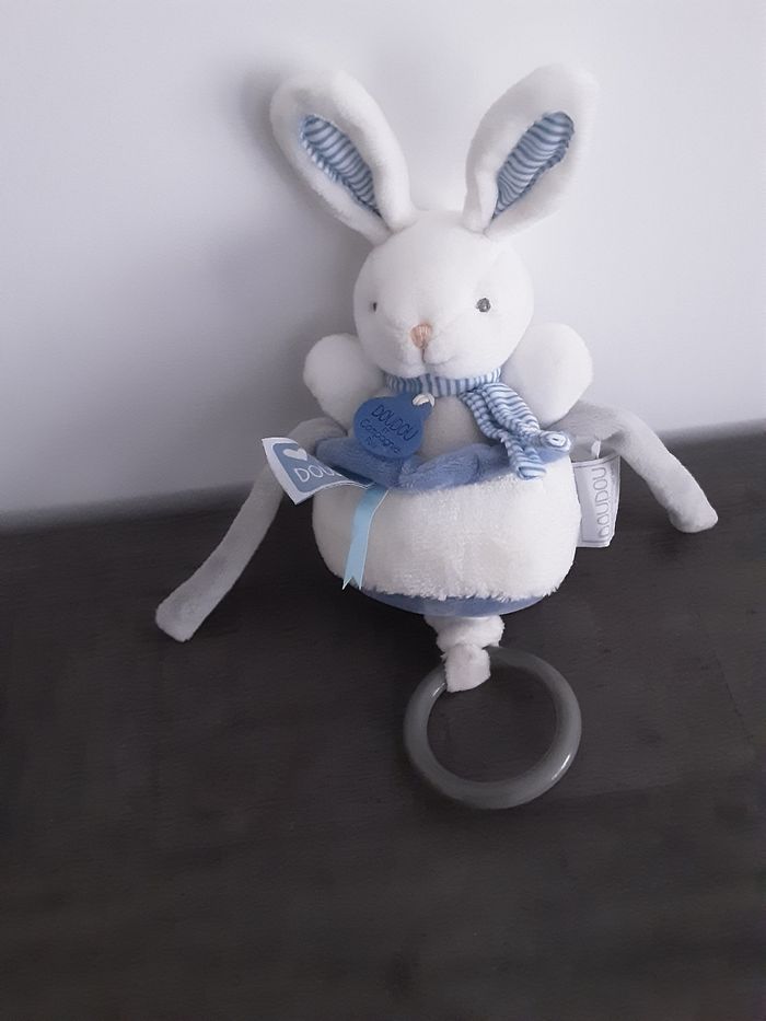 Peluche Musical Lapin Blanc/Bleu Peluche Musical Lapin Blanc/Bleu