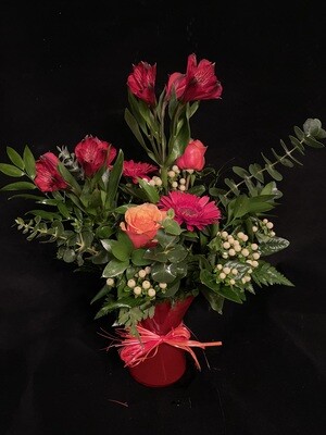 Bouquet de fleurs variées en vase 