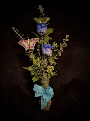 Duo de rose bleue en vase