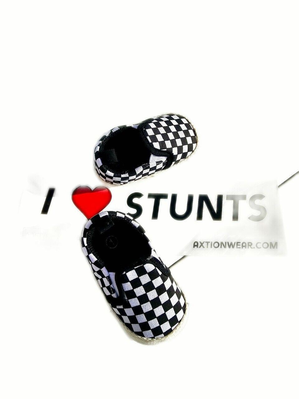 ​Black And White Checkered Skater Slip On Sneakers