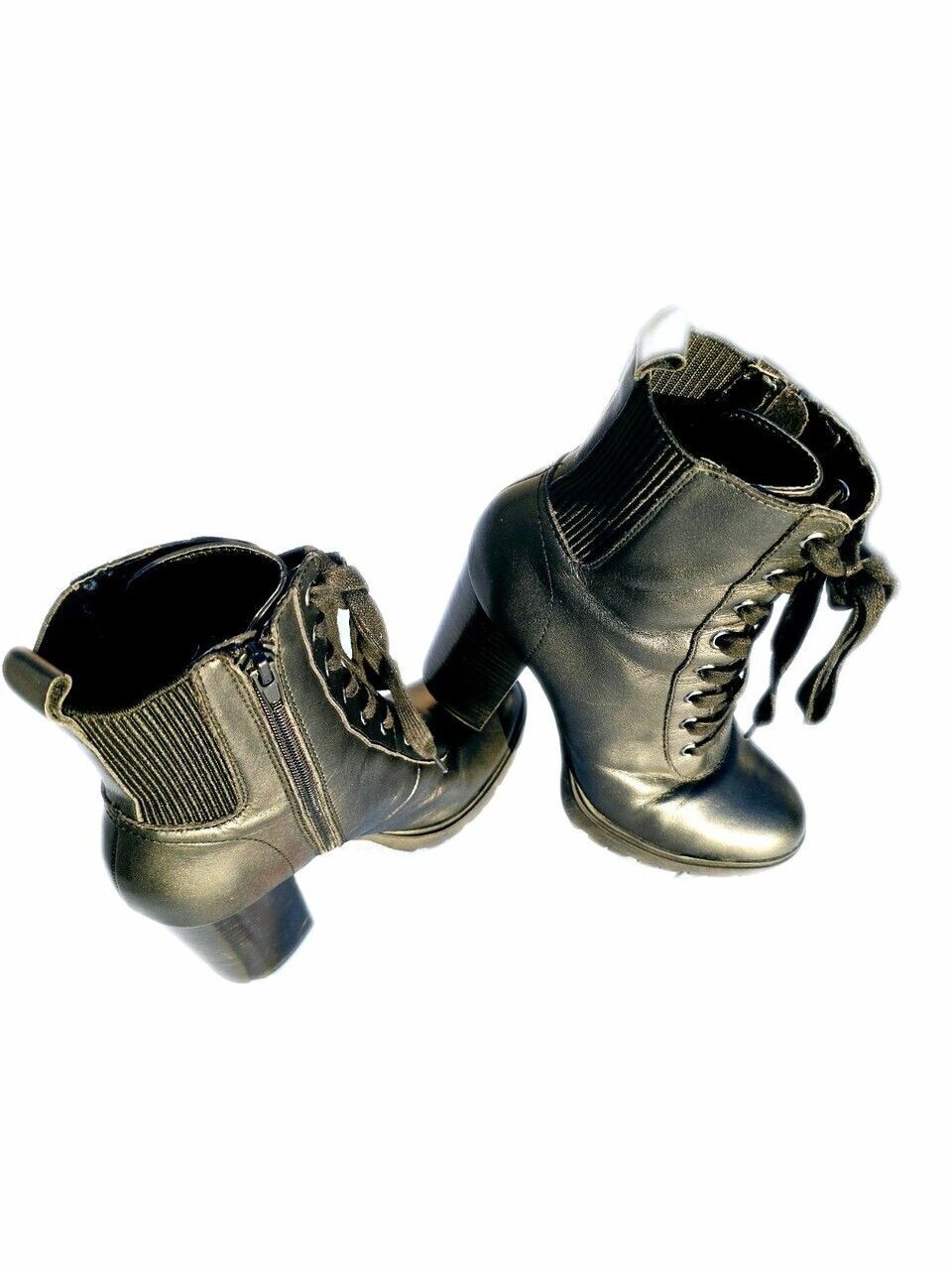 Designer Steve Madden Black Heel/Boots With A Side Zip