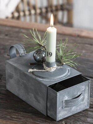 Danish candlestick in a metal box