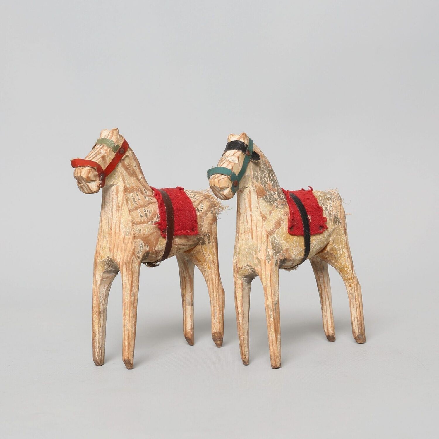 Two Swedish wooden horses around 1880