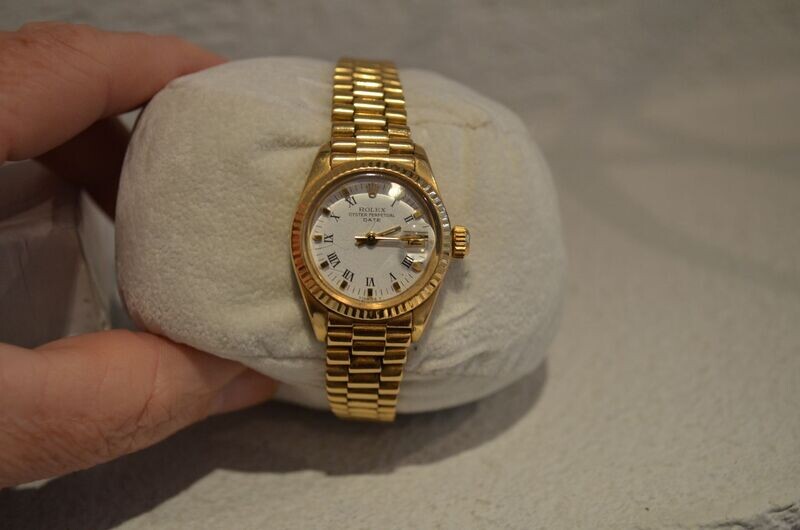 Goldene Rolex mit Präsidentenarmband