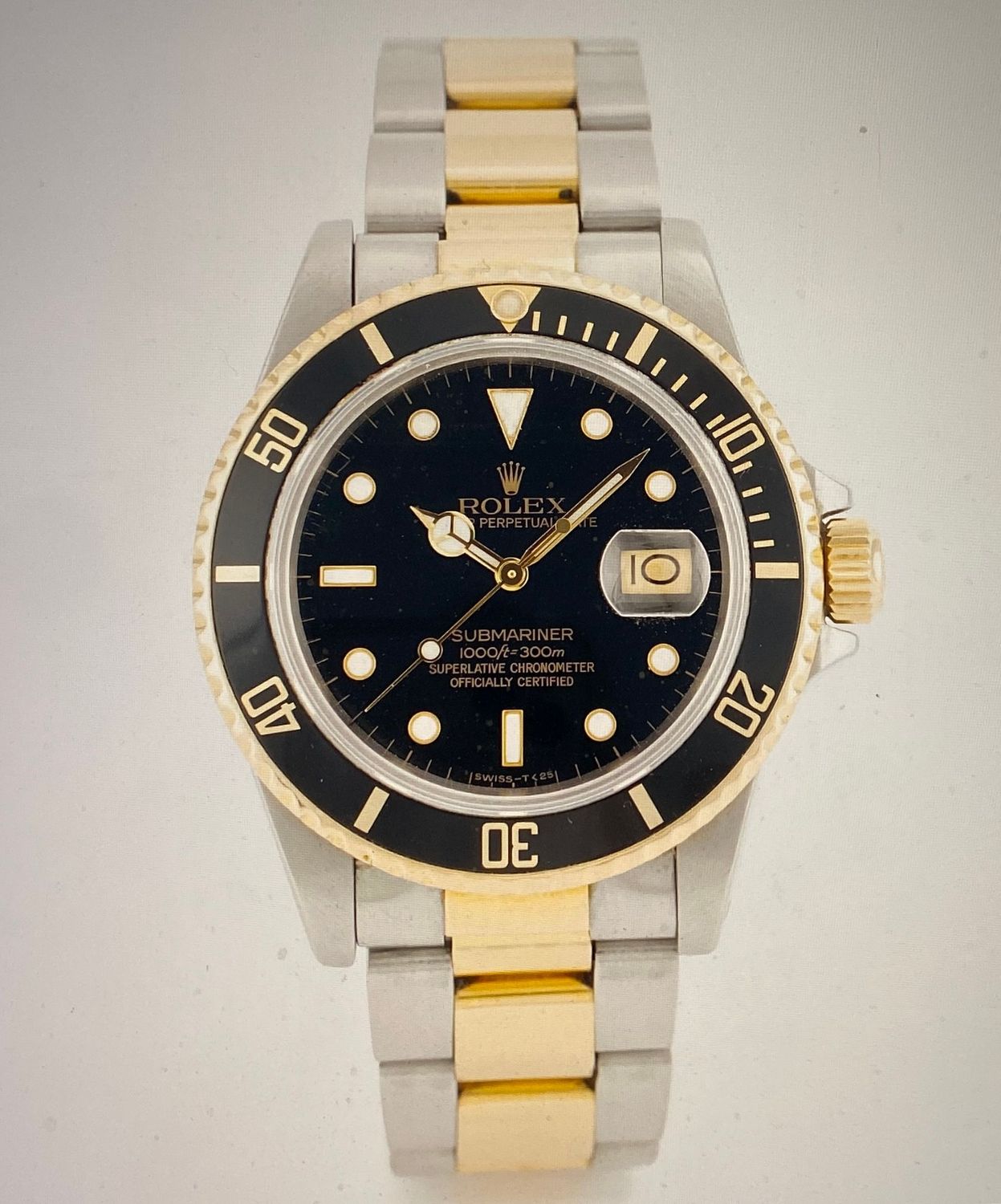 Rolex Submariner Stahl/Gold mit schwarzem Zifferblatt