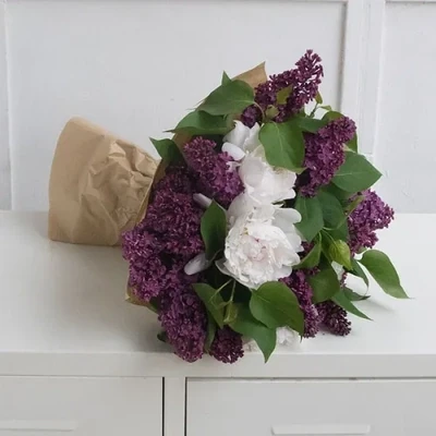 This bouquet consists of peonies and lilacs. The approximate size of the bouquet is 40-45 cm.