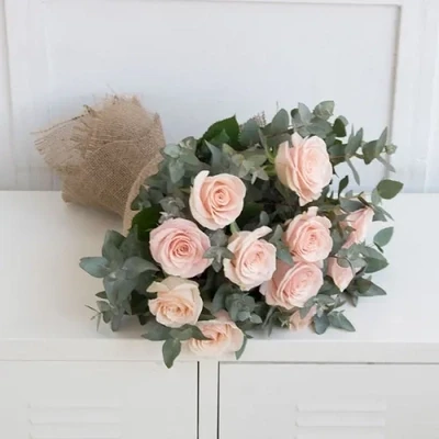 A bouquet of delicate pink roses