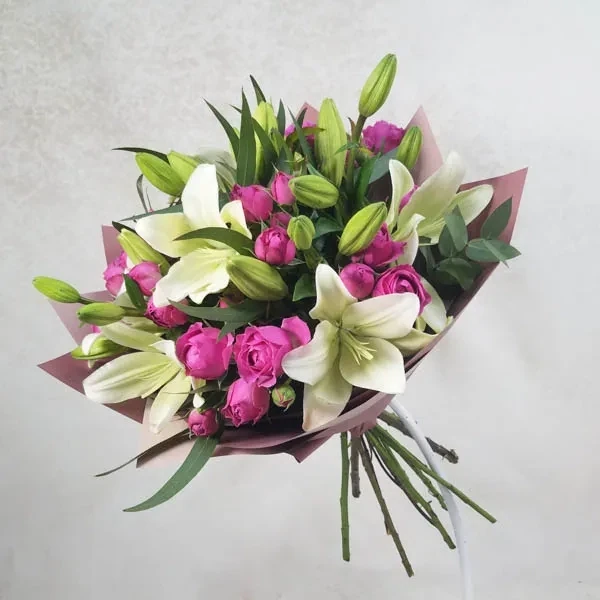 Lilies and spray roses