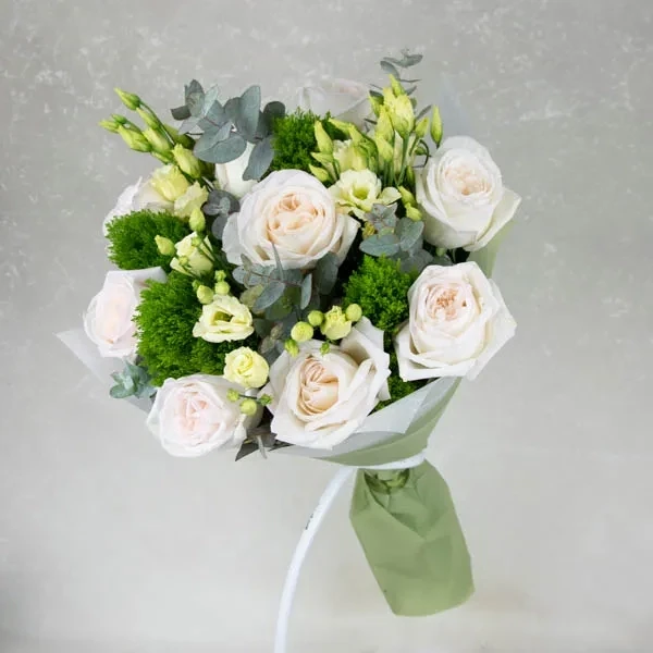 Delicate bouquet with white roses