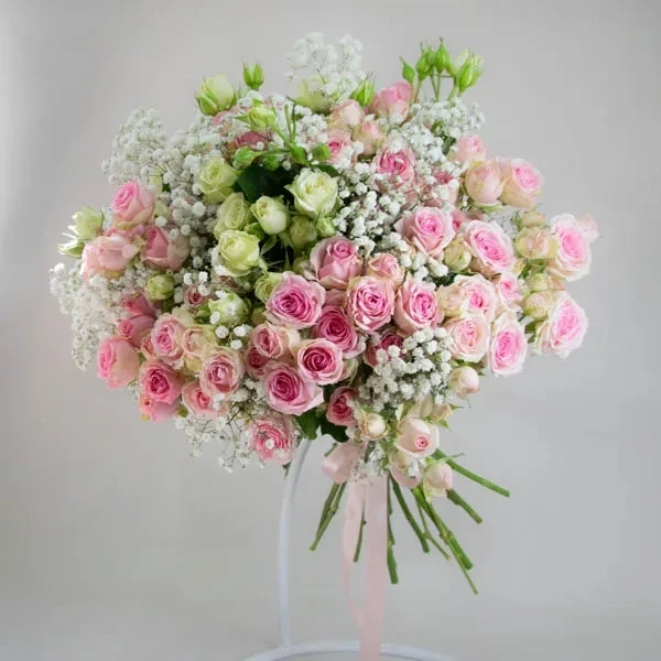 Spray roses with gypsophilla