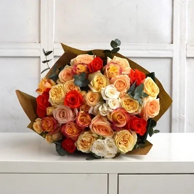 Bouquet of roses in peach colours