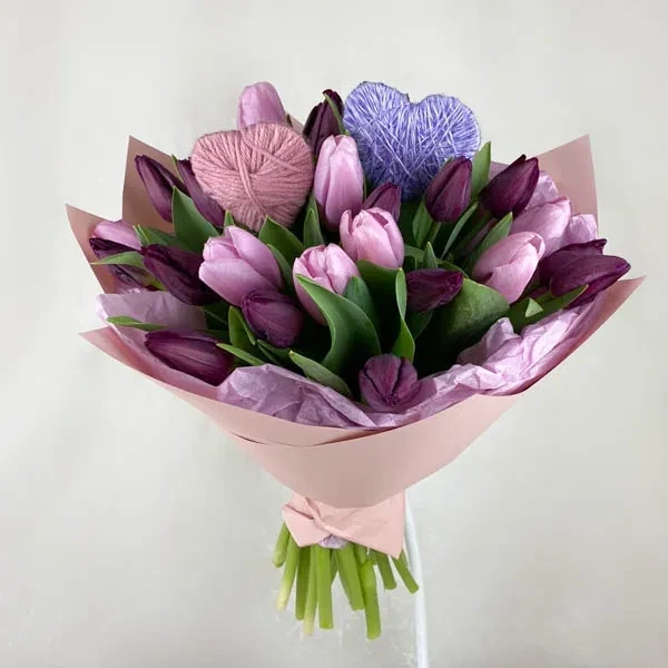 Bouquet with violet and pink tulips