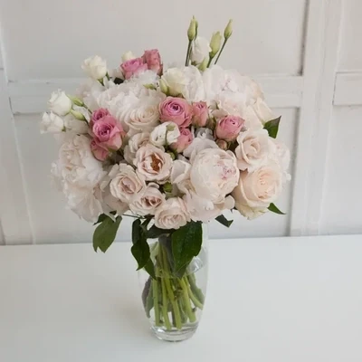 Peonies, roses and eustomas