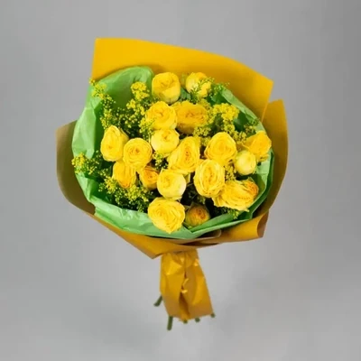 Bouquet with yellow spray roses and solidago