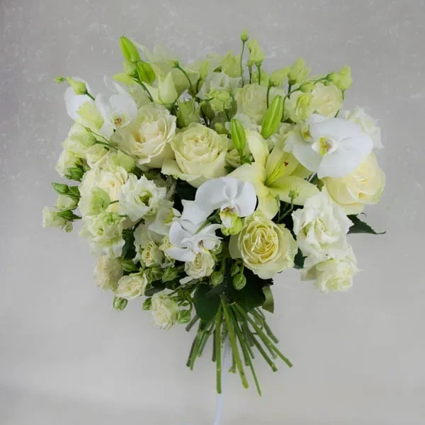 The bouquet consists of roses, lilies, and orchids. It needs to be ordered in advance.
