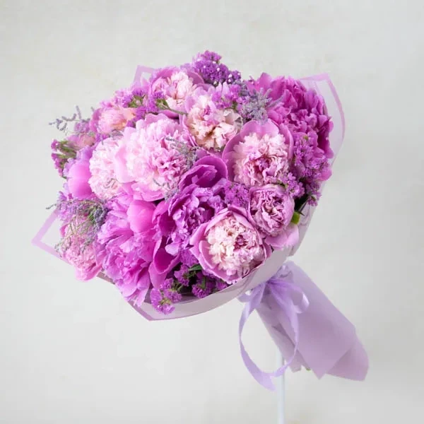 Peonies with astilbe and statice