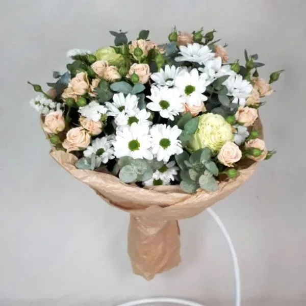 Tender bouquet with white chrysanthemums