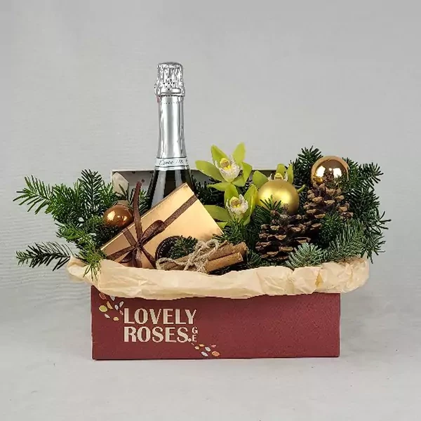 Box with orchid, champagne and chocolates