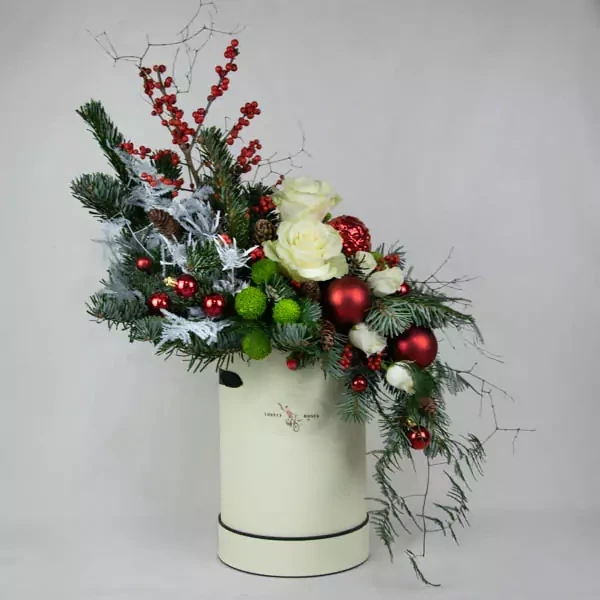 Flower arrangement in a high box