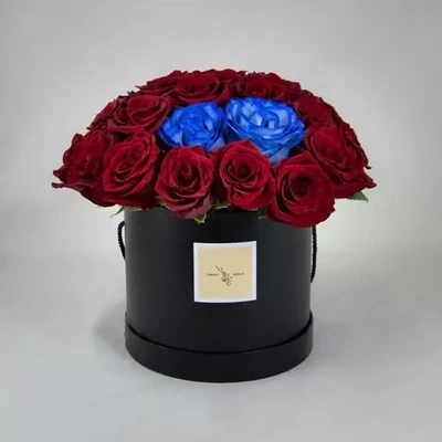 Roses in a black round box
