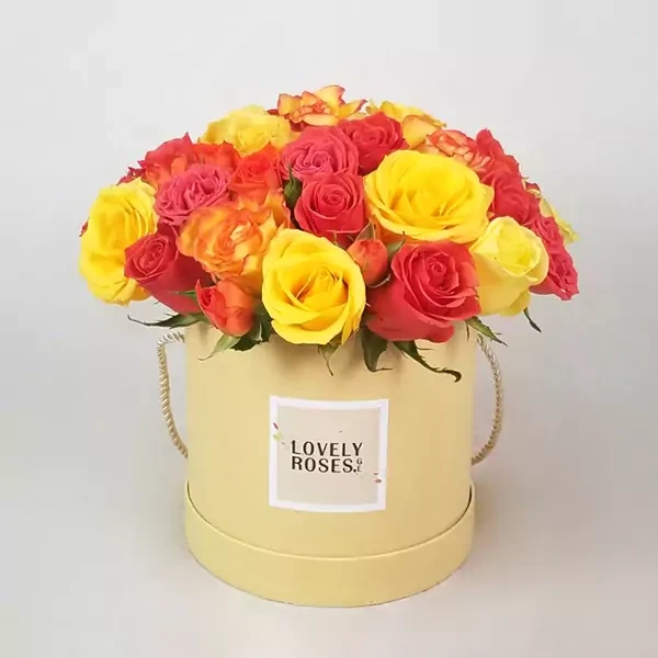 Arrangement with yellow and orange roses