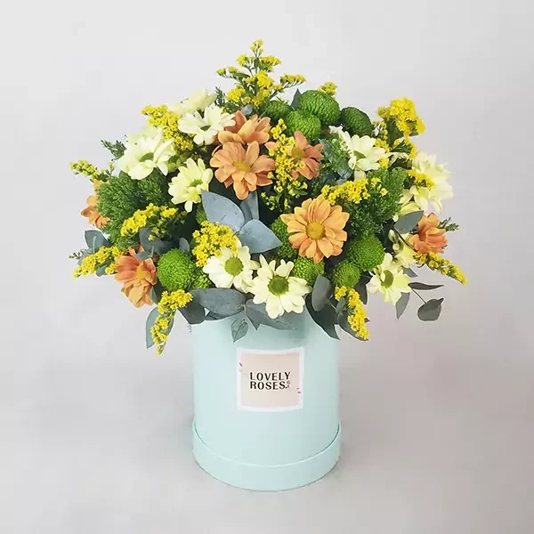 Flower arrangement in a high box