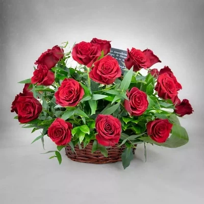 Funeral basket with red roses. The approximate size of the basket is 50×50 cm