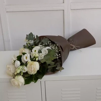 Funeral bouquet with white roses