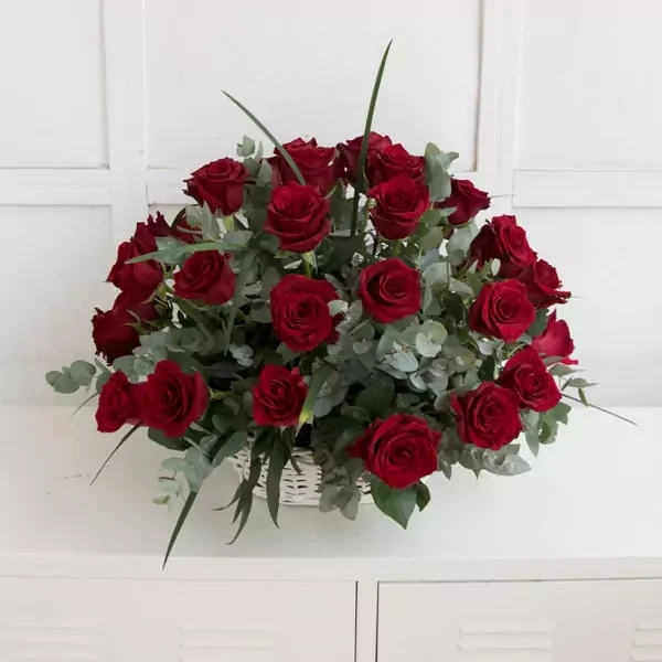50 red roses' arrangement in a basket