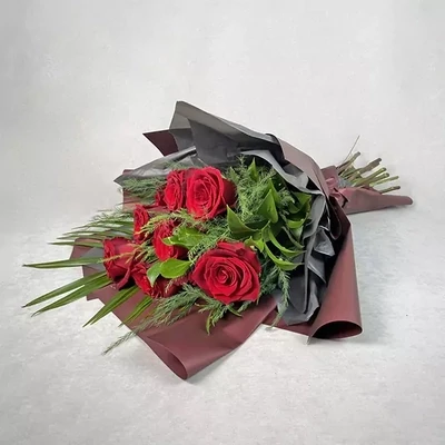 Funeral bouquet with red roses