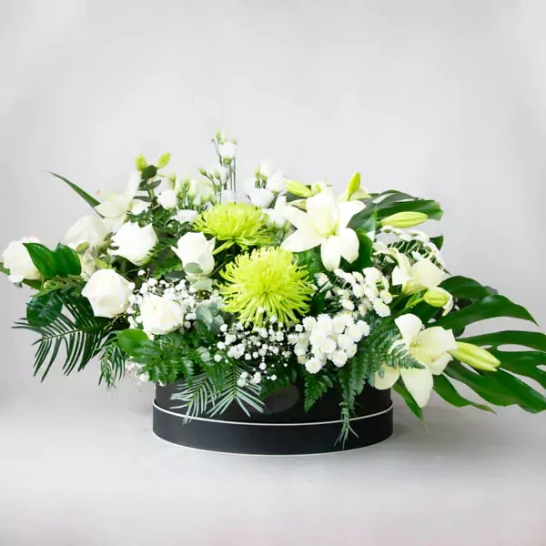 Funeral basket in green and white